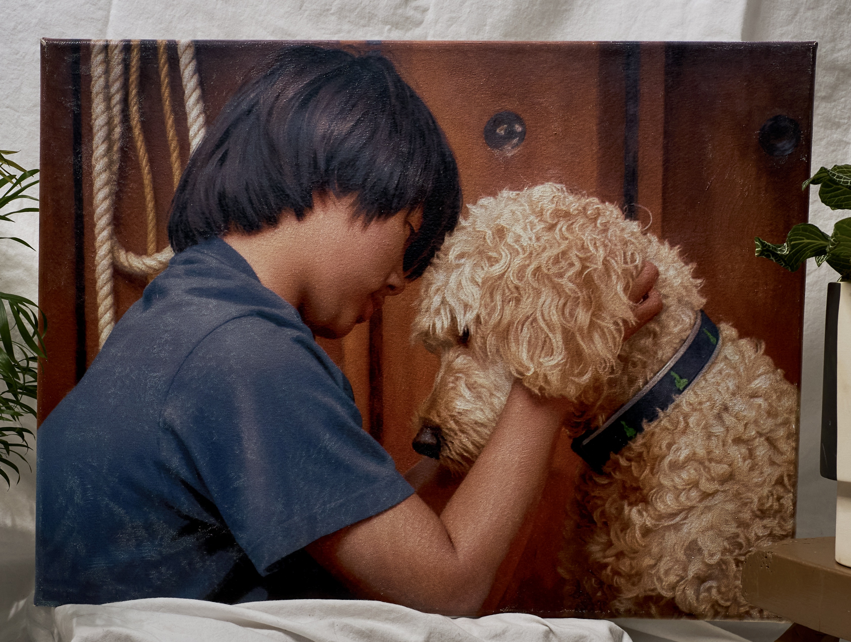 Oil on canvas portrait of a person and their dog